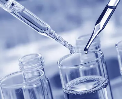 Two dropper pipettes are poised above a glass beaker filled with liquid, all set against a blue-toned background.