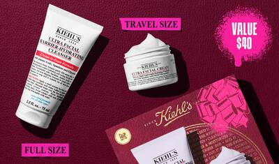 Une image affichant un tube blanc "KIEHL'S ULTRA FACIAL BARRIER-HYDRATING CLEANSER" etiquete "FULL SIZE" et un pot plus petit blanc "KIEHL'S ULTRA FACIAL CREAM" etiquete "TRAVEL SIZE". En haut a droite, une zone de texte rose eclaboussee indique "VALUE $40". Une boite cadeau Kiehl's partielle avec un noeud graphique rose est visible dans le coin inferieur droit.