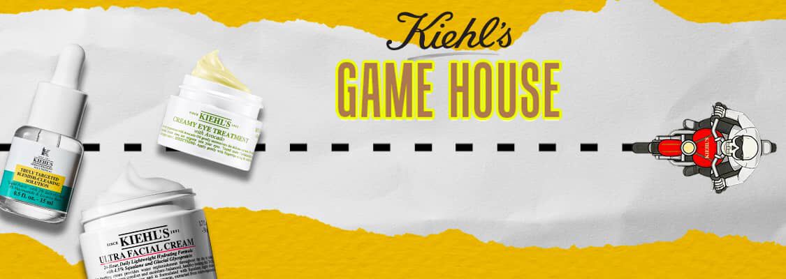 Een interactieve Kiehl's obstacle game interface met een uitnodiging om te spelen voor een extra cadeau.