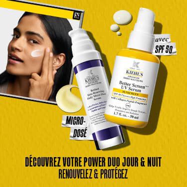 Image promotionnelle sur fond jaune vif presentant deux produits Kiehl's : le serum violet "Retinol Skin-Renewing Daily Micro-Dose Serum" et le soin jaune "Better Screen UV Serum Sunscreen SPF 50". Le texte en neerlandais se traduit par : "Decouvrez votre duo de choc pour le jour et la nuit. Renouvelez & protegez."