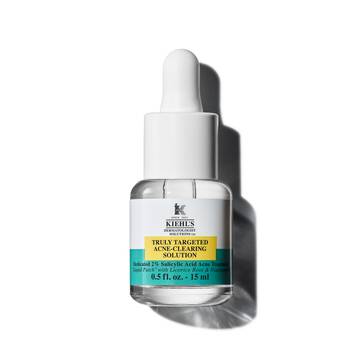 Un flacon de 15 ml de la solution Truly-Targeted Blemish-Clearing Solution de Kiehl's sur fond blanc.